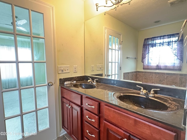 8 San Juan Ct, Elizabethtown, KY 42701 - bathroom featuring double vanity and a textured ceiling