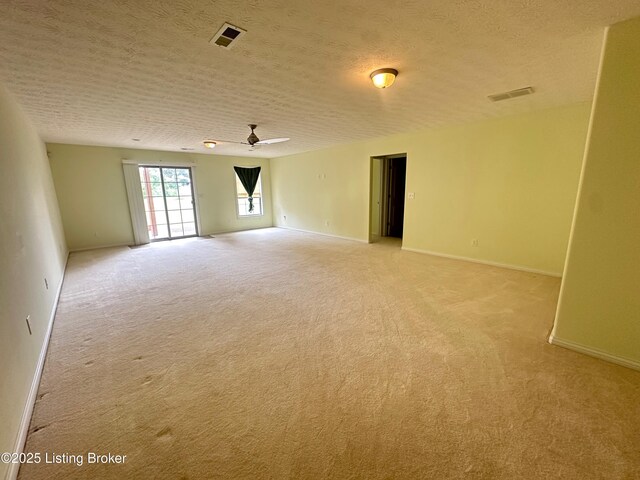 8 San Juan Ct, Elizabethtown, KY 42701 - spare room featuring light carpet, a ceiling fan, and a textured ceiling