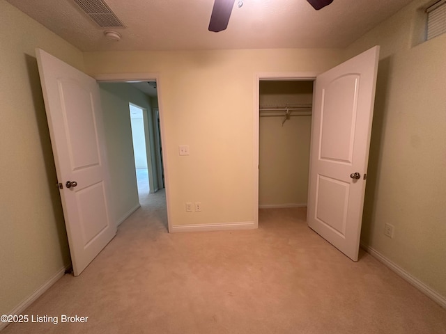 8 San Juan Ct, Elizabethtown, KY 42701 - unfurnished bedroom featuring light colored carpet, a closet, and a ceiling fan