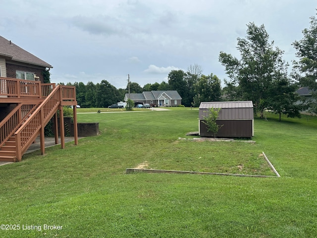 8 San Juan Ct, Elizabethtown, KY 42701 - view of green lawn featuring a shed, a wooden deck, and stairs