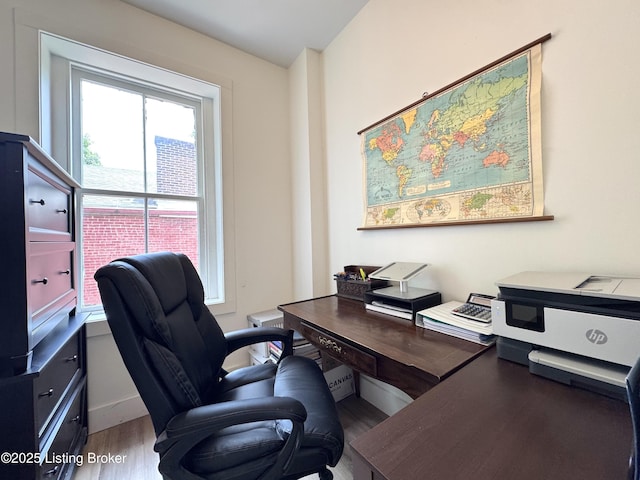 416 Belgravia Ct, Louisville, KY 40208 - home office featuring healthy amount of natural light and wood finished floors