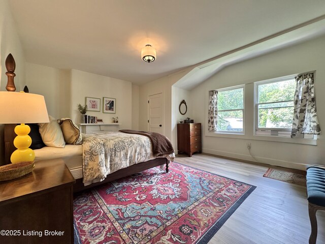 416 Belgravia Ct, Louisville, KY 40208 - bedroom with wood finished floors and baseboards