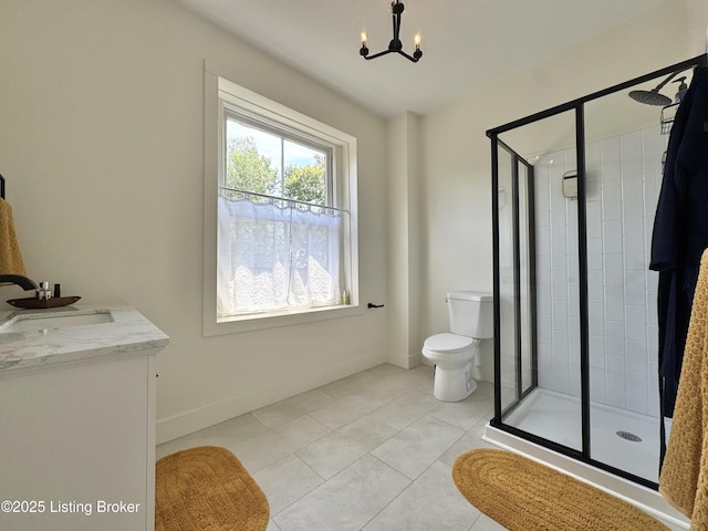 416 Belgravia Ct, Louisville, KY 40208 - full bathroom with a stall shower, a chandelier, tile patterned floors, and double vanity