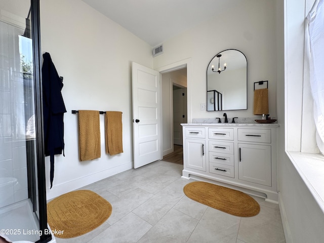 416 Belgravia Ct, Louisville, KY 40208 - bathroom featuring vanity, a shower with shower door, and tile patterned floors