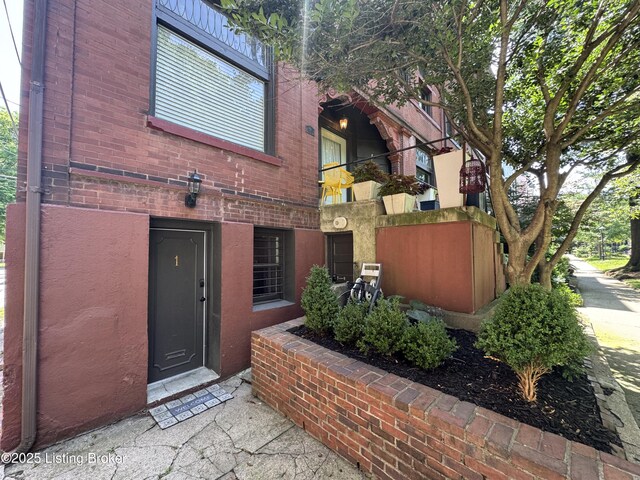 416 Belgravia Ct, Louisville, KY 40208 - view of exterior entry with brick siding