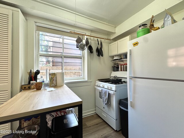 416 Belgravia Ct, Louisville, KY 40208 - kitchen with white appliances, wood finished floors, and white cabinets