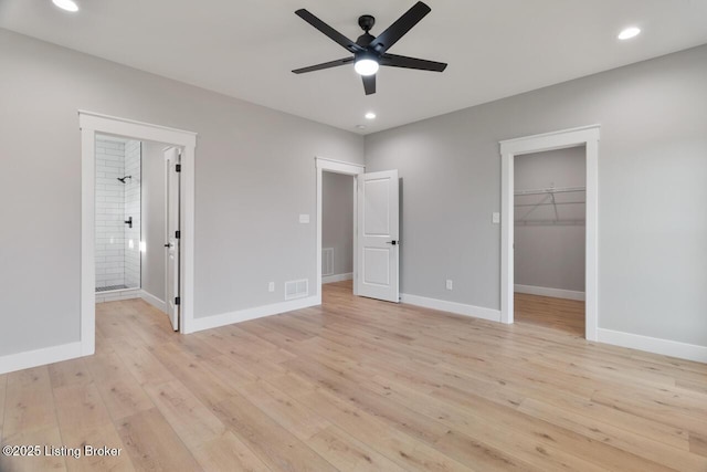 488 Capps Rd, Campbellsville, KY 42718 - unfurnished bedroom with light wood-style floors, a walk in closet, recessed lighting, connected bathroom, and ceiling fan
