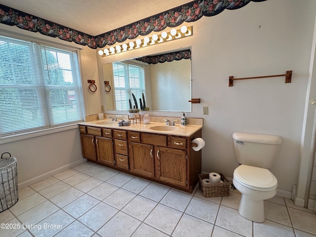 64 Probus Rd, Leitchfield, KY 42754 - full bath with tile patterned flooring, double vanity, and a textured ceiling