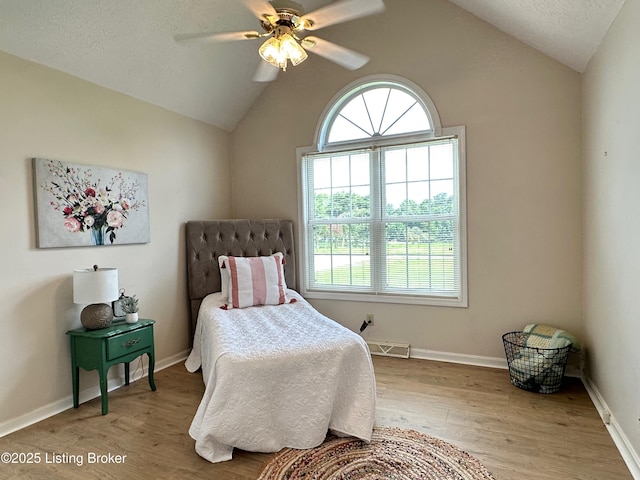 64 Probus Rd, Leitchfield, KY 42754 - bedroom with vaulted ceiling, wood finished floors, and ceiling fan