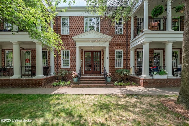 9508 Norton Commons Blvd Unit 102, Prospect, KY 40059 - view of front of property featuring french doors and brick siding
