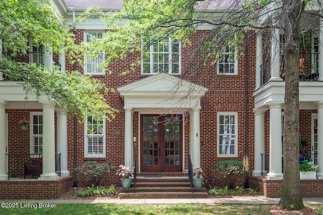 9508 Norton Commons Blvd Unit 102, Prospect, KY 40059 - view of exterior entry featuring brick siding and french doors