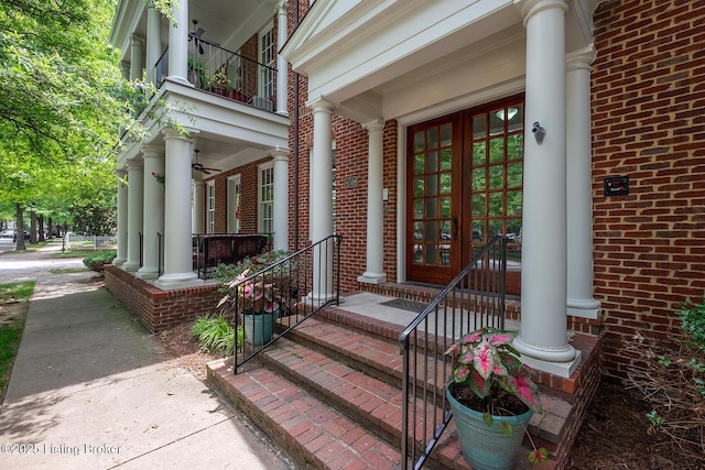 9508 Norton Commons Blvd Unit 102, Prospect, KY 40059 - doorway to property with covered porch, brick siding, and french doors