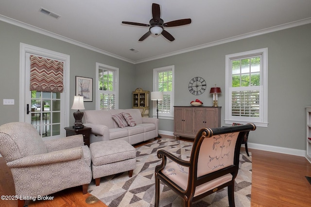 9508 Norton Commons Blvd Unit 102, Prospect, KY 40059 - living area featuring healthy amount of natural light, light wood-type flooring, ornamental molding, and ceiling fan