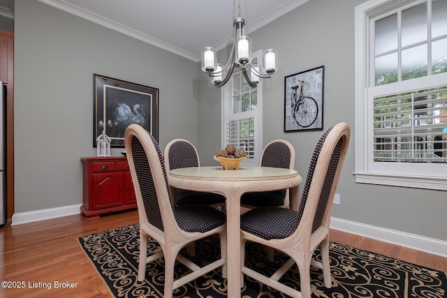 9508 Norton Commons Blvd Unit 102, Prospect, KY 40059 - dining room with a chandelier, ornamental molding, and wood finished floors