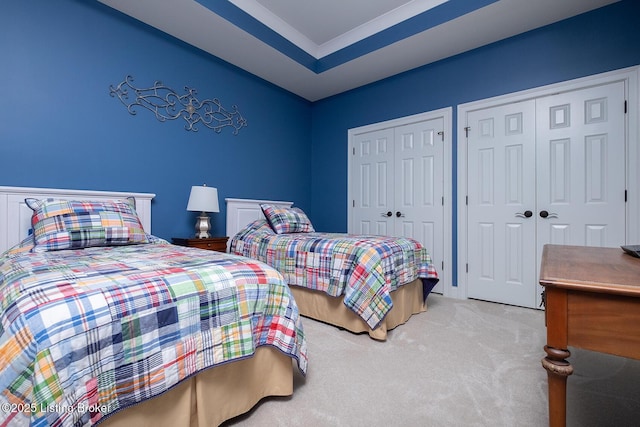 9508 Norton Commons Blvd Unit 102, Prospect, KY 40059 - bedroom featuring two closets and light carpet