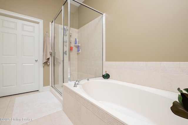 9508 Norton Commons Blvd Unit 102, Prospect, KY 40059 - bathroom with a bath, a stall shower, and tile patterned floors