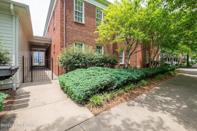 9508 Norton Commons Blvd Unit 102, Prospect, KY 40059 - property entrance with brick siding and a gate
