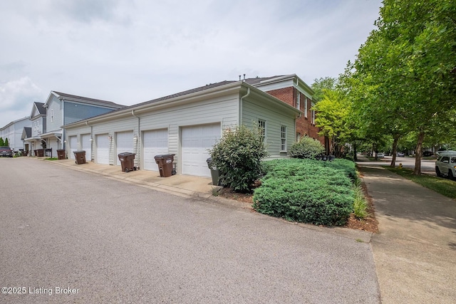 9508 Norton Commons Blvd Unit 102, Prospect, KY 40059 - view of side of home featuring community garages