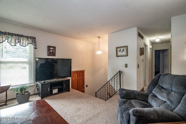 825 Crocus Dr, Radcliff, KY 40160 - carpeted living area with a textured ceiling