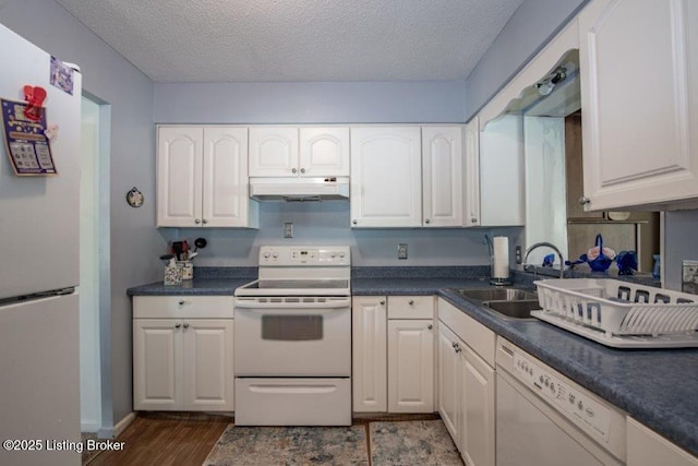 825 Crocus Dr, Radcliff, KY 40160 - kitchen featuring white appliances, under cabinet range hood, a textured ceiling, white cabinetry, and wood finished floors