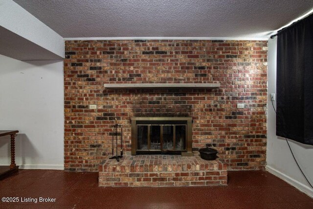825 Crocus Dr, Radcliff, KY 40160 - unfurnished living room featuring a textured ceiling and a fireplace