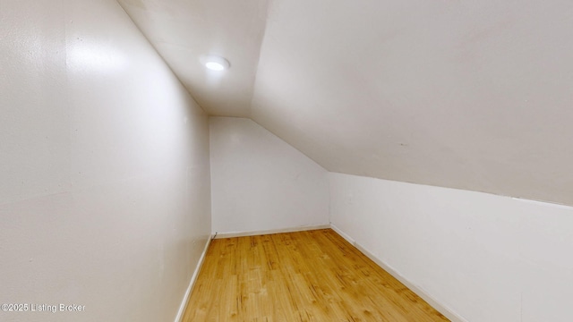 1117 6th St, Carrollton, KY 41008 - bonus room with lofted ceiling, light wood-type flooring, and recessed lighting
