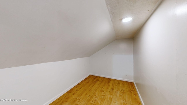1117 6th St, Carrollton, KY 41008 - bonus room featuring vaulted ceiling and light wood-style floors