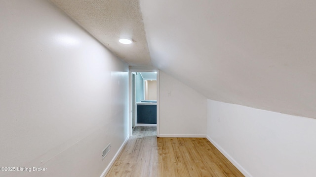 1117 6th St, Carrollton, KY 41008 - bonus room featuring light wood finished floors and vaulted ceiling
