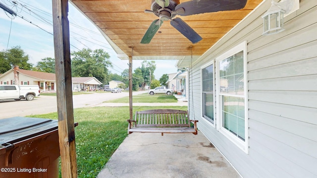 1117 6th St, Carrollton, KY 41008 - covered porch with a yard and a ceiling fan