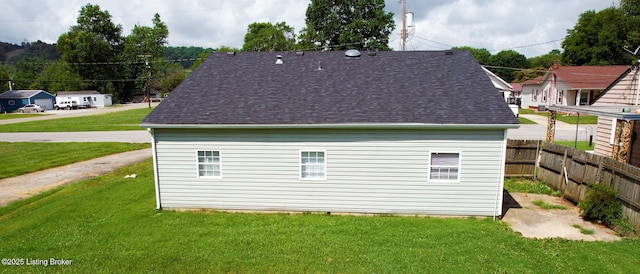 1117 6th St, Carrollton, KY 41008 - view of side of property with a shingled roof