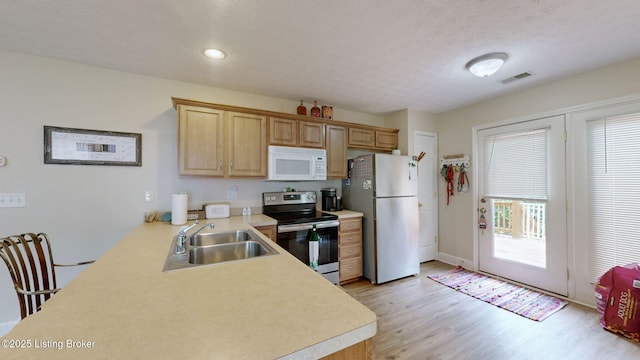 7236 Michael Benjamin Cir, Crestwood, KY 40014 - kitchen featuring white microwave, electric range, freestanding refrigerator, light countertops, and light wood-type flooring
