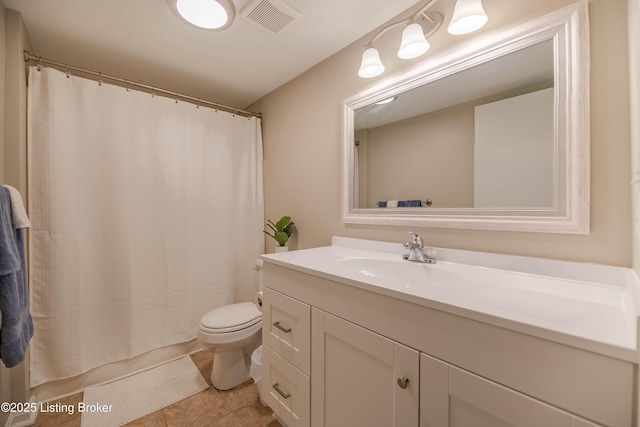 2745 Grinstead Dr Apt 113, Louisville, KY 40206 - full bath featuring vanity, tile patterned flooring, and curtained shower