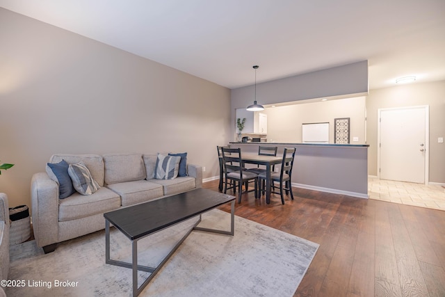 2745 Grinstead Dr Apt 113, Louisville, KY 40206 - living room with hardwood / wood-style flooring and baseboards