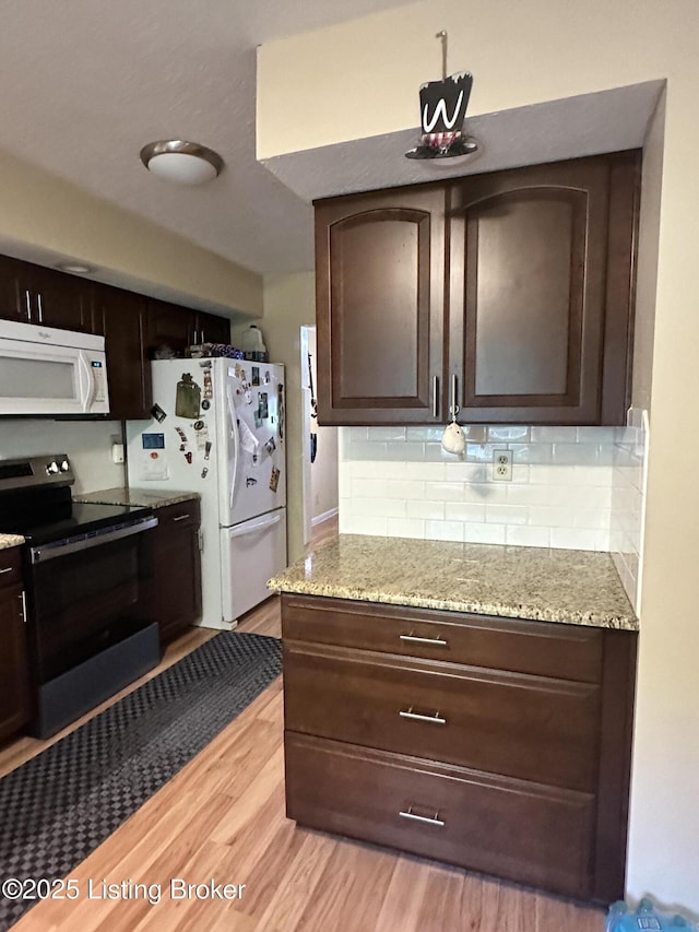 509 Piping Rock Rd, Brandenburg, KY 40108 - kitchen featuring white appliances, light wood-type flooring, and dark brown cabinetry