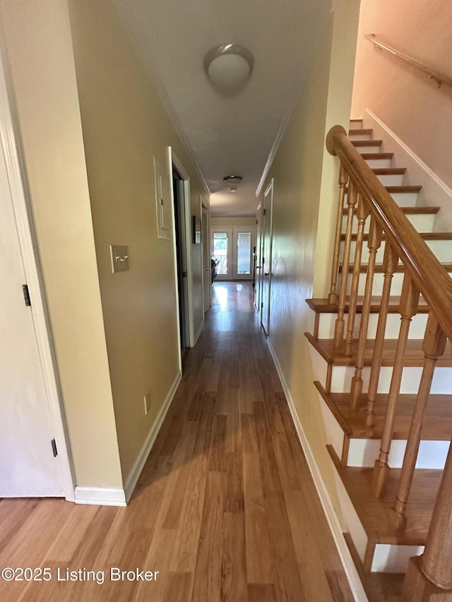 509 Piping Rock Rd, Brandenburg, KY 40108 - corridor featuring wood finished floors, ornamental molding, and stairs