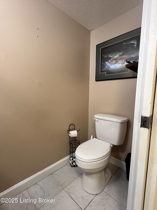 509 Piping Rock Rd, Brandenburg, KY 40108 - bathroom featuring marble finish flooring and a textured ceiling