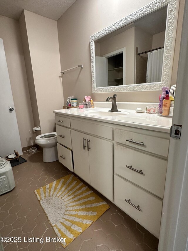 509 Piping Rock Rd, Brandenburg, KY 40108 - full bath with tile patterned flooring, vanity, and a textured ceiling