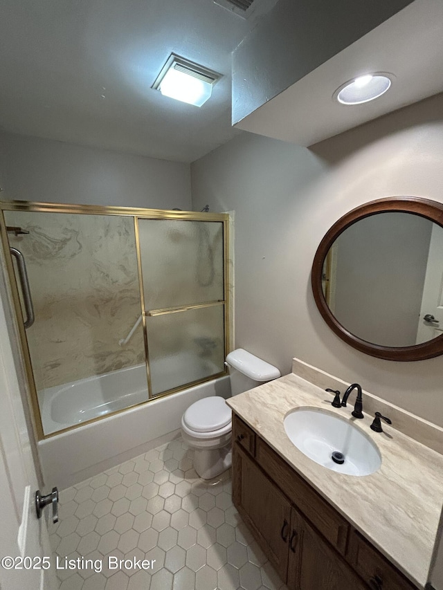 4125 Browns Ln Unit 117, Louisville, KY 40220 - full bathroom with combined bath / shower with glass door, vanity, and tile patterned floors