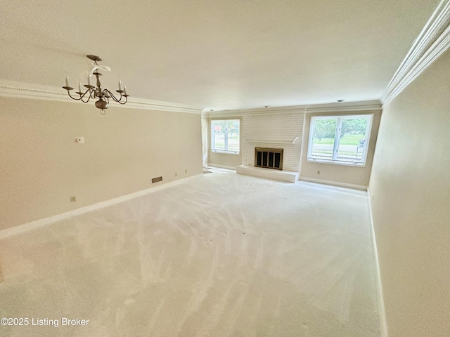 4125 Browns Ln Unit 117, Louisville, KY 40220 - unfurnished living room with crown molding, a chandelier, light colored carpet, and a fireplace
