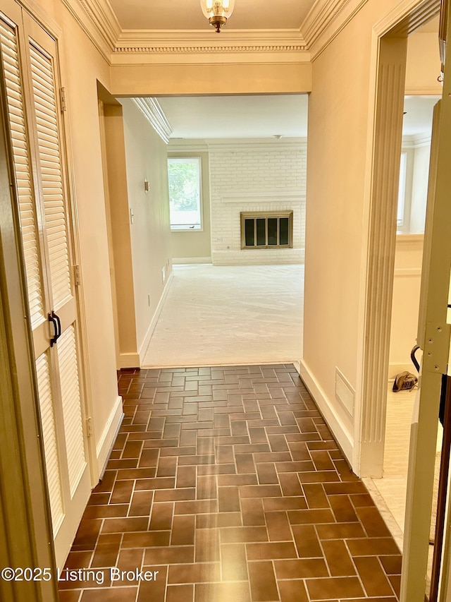 4125 Browns Ln Unit 117, Louisville, KY 40220 - hall featuring brick patterned floors and ornamental molding