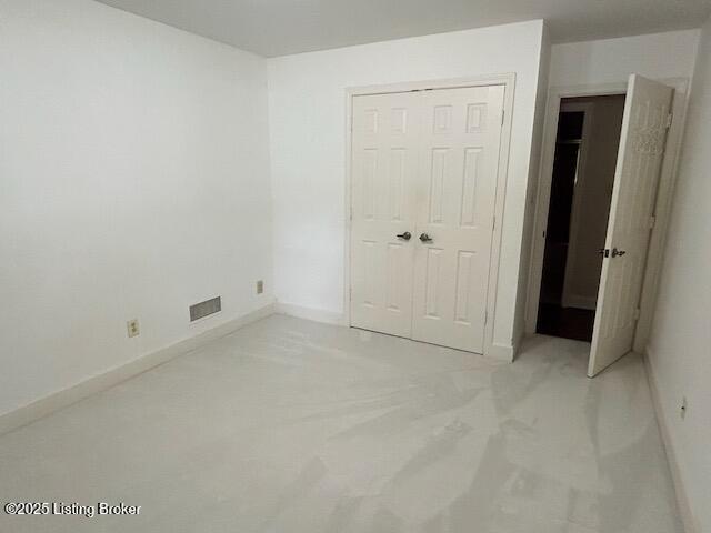 4125 Browns Ln Unit 117, Louisville, KY 40220 - unfurnished bedroom with light colored carpet and a closet