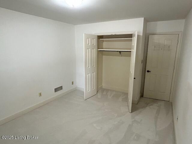 4125 Browns Ln Unit 117, Louisville, KY 40220 - unfurnished bedroom with a closet and light colored carpet