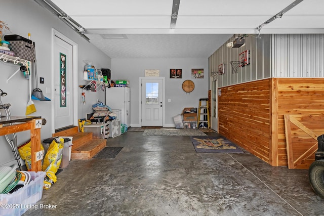 63 Davis Norton Ln, Harned, KY 40144 - garage with a garage door opener