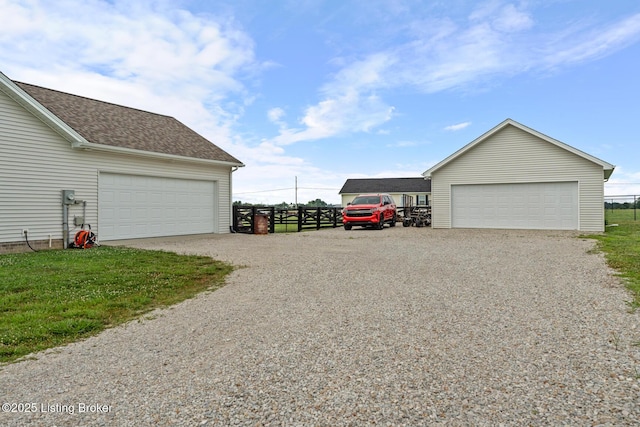 63 Davis Norton Ln, Harned, KY 40144 - detached garage with gravel driveway