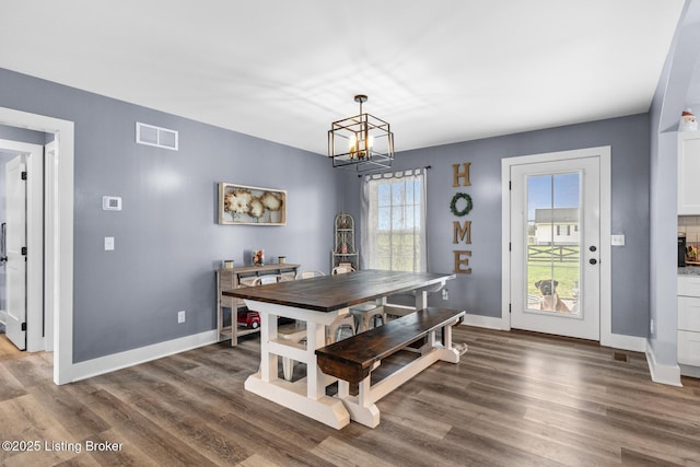 63 Davis Norton Ln, Harned, KY 40144 - dining space with dark wood finished floors and a chandelier