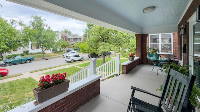 1910 Alfresco Pl, Louisville, KY 40205 - porch featuring a lawn
