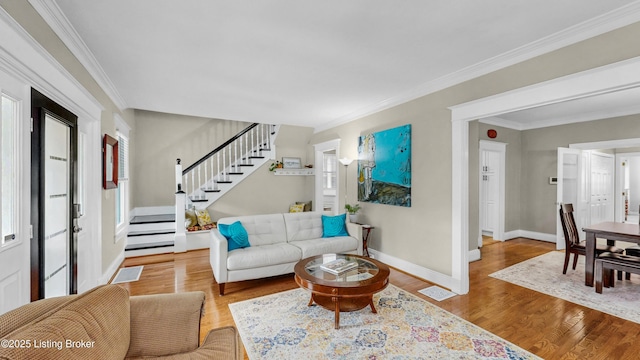 1910 Alfresco Pl, Louisville, KY 40205 - living room with stairs, wood finished floors, and ornamental molding