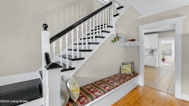 1910 Alfresco Pl, Louisville, KY 40205 - staircase with wood finished floors and baseboards