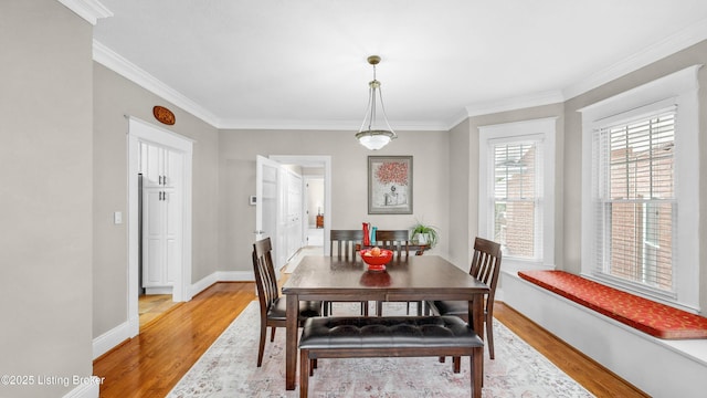 1910 Alfresco Pl, Louisville, KY 40205 - dining area with light wood-style floors and crown molding