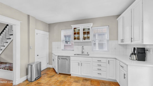 1910 Alfresco Pl, Louisville, KY 40205 - kitchen with dishwasher, backsplash, white cabinetry, and light countertops